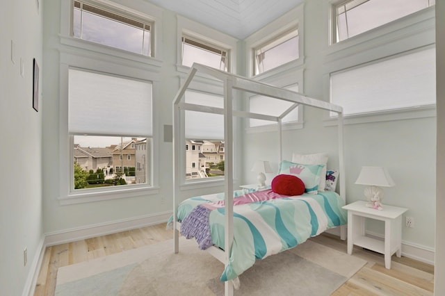 243 N Point Rd, Ocean City, NJ 08226 - bedroom featuring multiple windows and hardwood / wood-style flooring