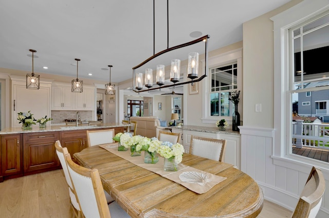 243 N Point Rd, Ocean City, NJ 08226 - dining area with sink and light hardwood / wood-style flooring