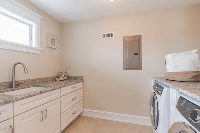 243 N Point Rd, Ocean City, NJ 08226 - clothes washing area featuring light tile patterned flooring, sink, cabinets, washing machine and clothes dryer, and electric panel