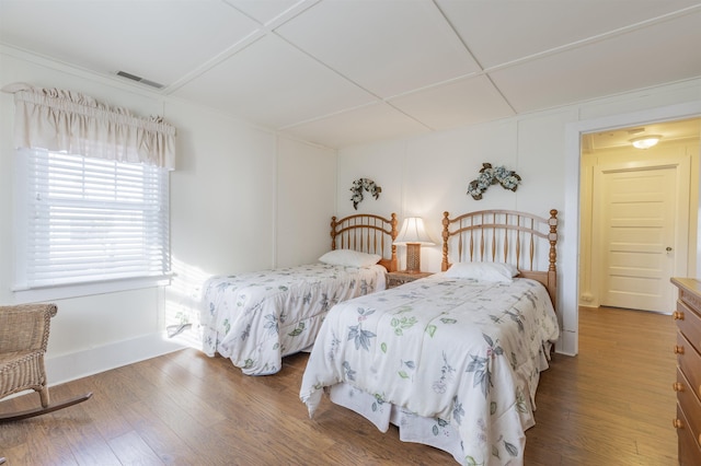 bedroom featuring hardwood / wood-style floors