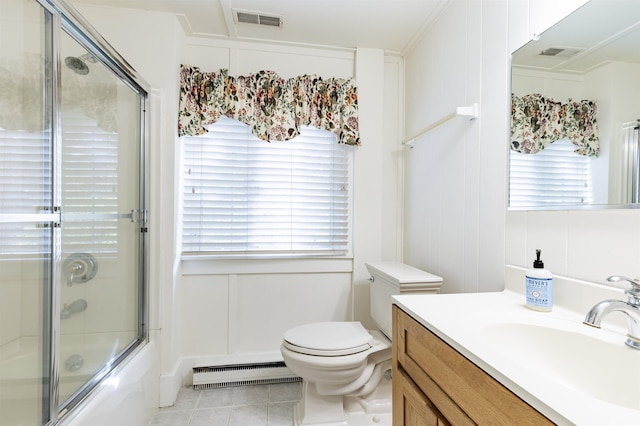 full bathroom with vanity, shower / bath combination with glass door, a baseboard radiator, tile patterned flooring, and toilet