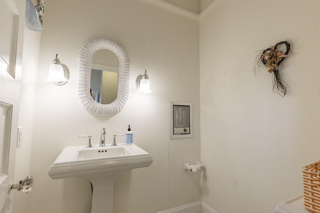 bathroom featuring crown molding