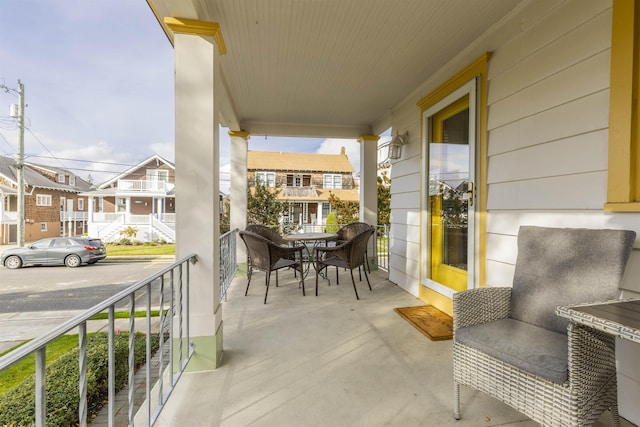 balcony featuring covered porch