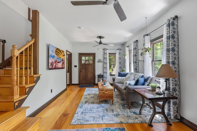 463 Rte 47 N, Goshen, NJ 08210 - living room featuring a ceiling fan, wood finished floors, stairway, and baseboards