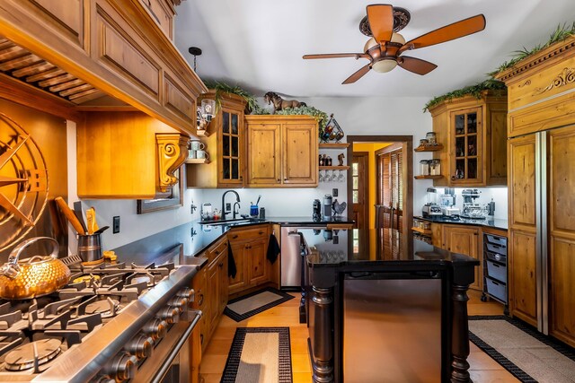 463 Rte 47 N, Goshen, NJ 08210 - kitchen featuring open shelves, appliances with stainless steel finishes, a sink, a ceiling fan, and dark countertops