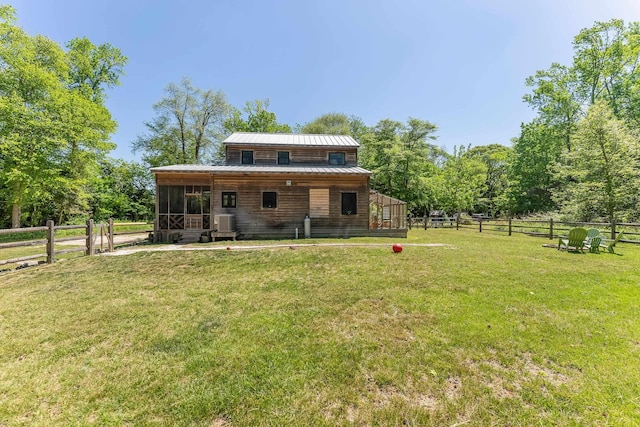 463 Rte 47 N, Goshen, NJ 08210 - rear view of property featuring a sunroom, a yard, and metal roof