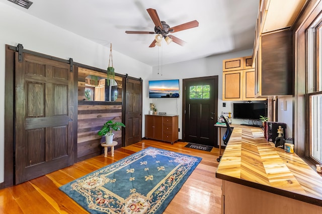 463 Rte 47 N, Goshen, NJ 08210 - office featuring a barn door, light wood finished floors, and a ceiling fan