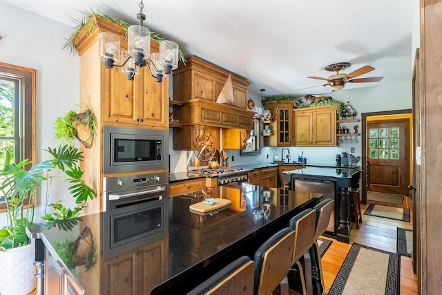 463 Rte 47 N, Goshen, NJ 08210 - kitchen with open shelves, appliances with stainless steel finishes, healthy amount of natural light, and a chandelier