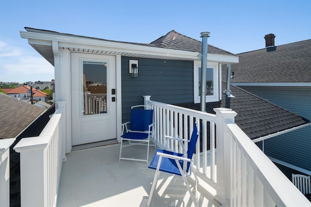 810 E 7th St Unit 4, Ocean City, NJ 08226 - property entrance with a shingled roof and a balcony