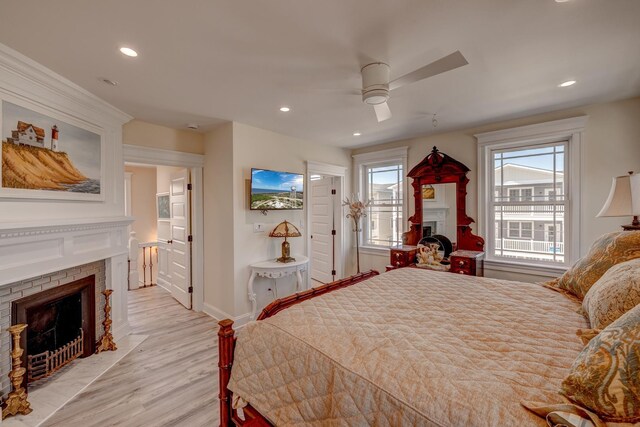 2901 Pacific Ave, Wildwood, NJ 08260 - bedroom featuring light wood finished floors, multiple windows, a fireplace, and recessed lighting