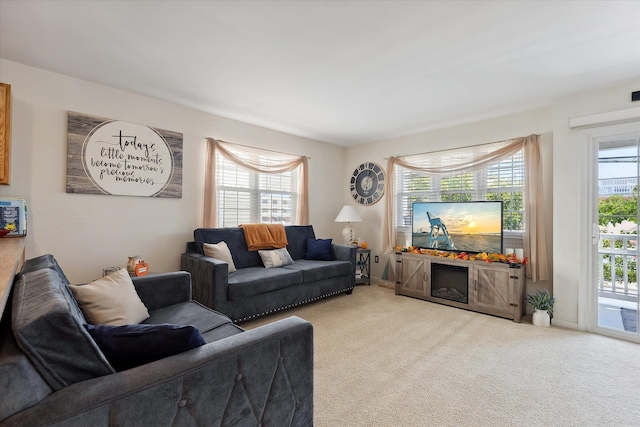 living room featuring light colored carpet