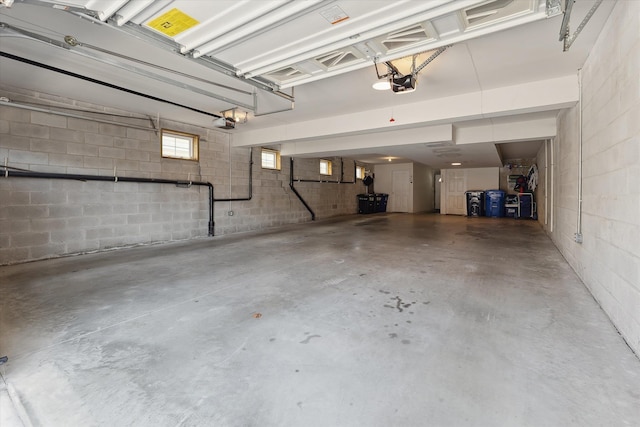 garage featuring a garage door opener