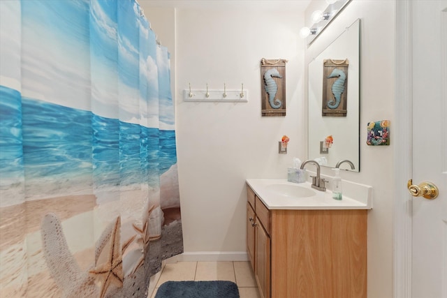 bathroom featuring tile patterned floors and vanity