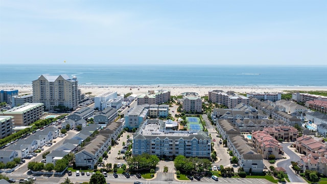 9907 Seapointe Blvd Unit 215, Lower Township, NJ 08260 - drone / aerial view of waterfront with a beach