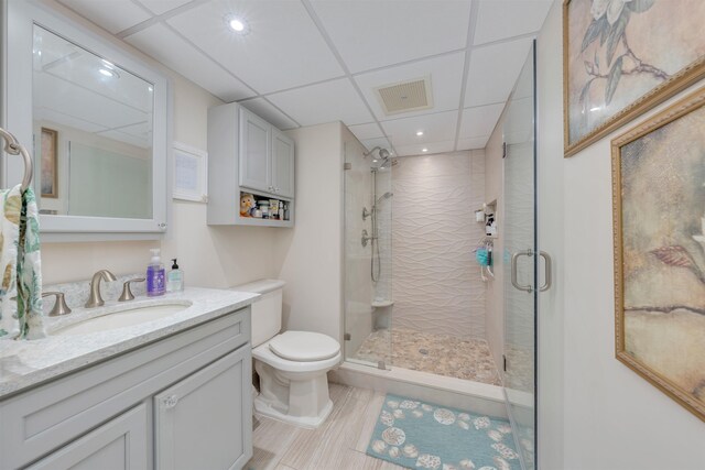 9907 Seapointe Blvd Unit 215, Lower Township, NJ 08260 - full bathroom featuring a stall shower, vanity, a drop ceiling, and recessed lighting