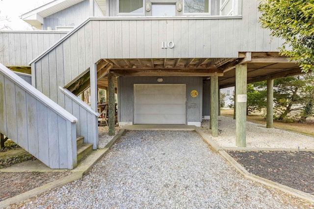 doorway to property featuring a garage