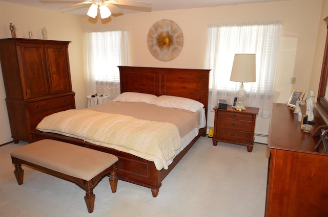 10 Timberlea Ln, Cape May Court House, NJ 08210 - bedroom with a ceiling fan, a baseboard heating unit, and light colored carpet