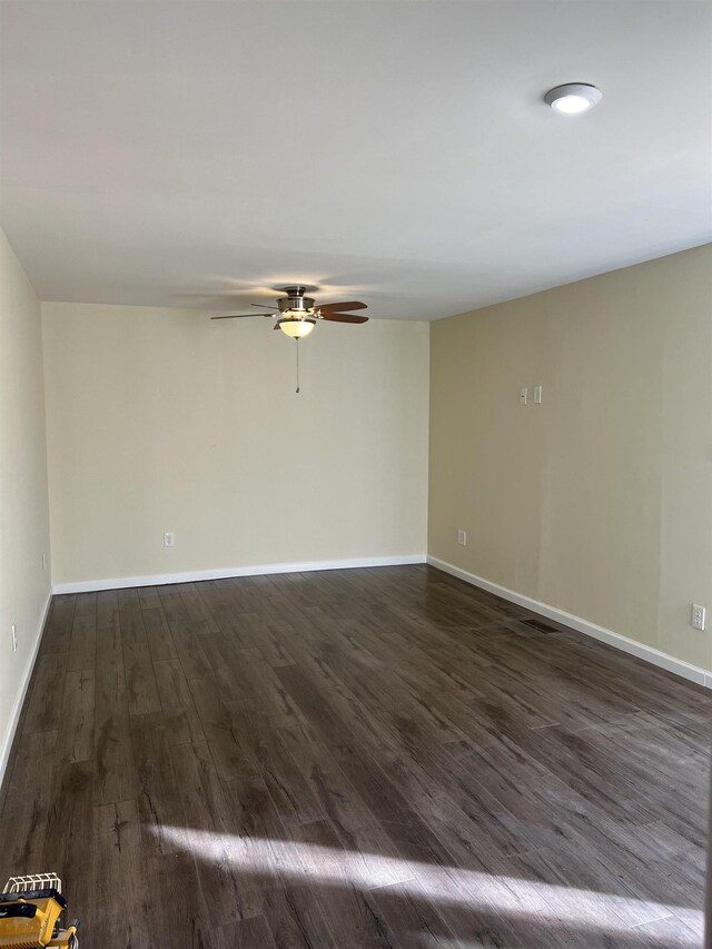 corridor featuring dark hardwood / wood-style floors