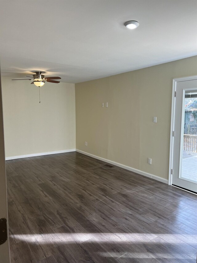 corridor featuring dark hardwood / wood-style flooring