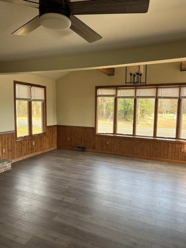 unfurnished room featuring dark hardwood / wood-style flooring and ceiling fan