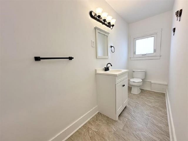 148 E Burk Ave Unit 3, Wildwood, NJ 08260 - bathroom with baseboards and vanity