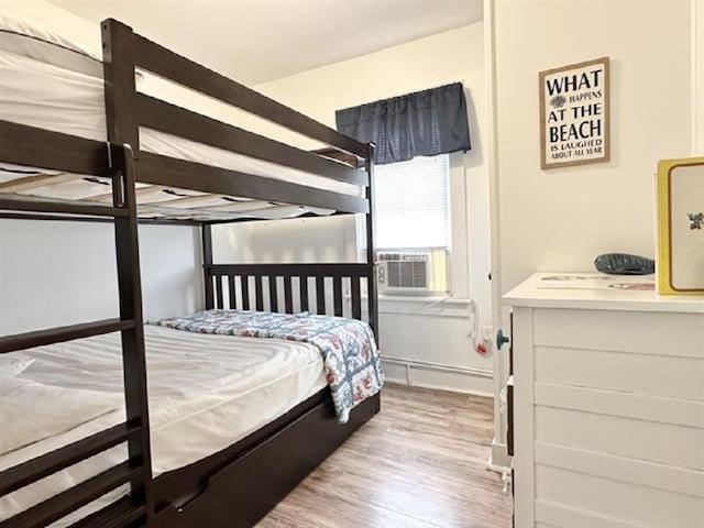 148 E Burk Ave Unit 3, Wildwood, NJ 08260 - bedroom featuring wood finished floors and cooling unit