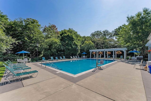 7 Herron Ct Unit 40, Cape May Court House, NJ 08210 - community pool featuring a pergola, a patio, and view of scattered trees
