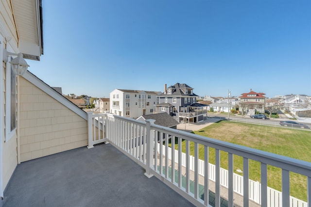 balcony featuring a residential view
