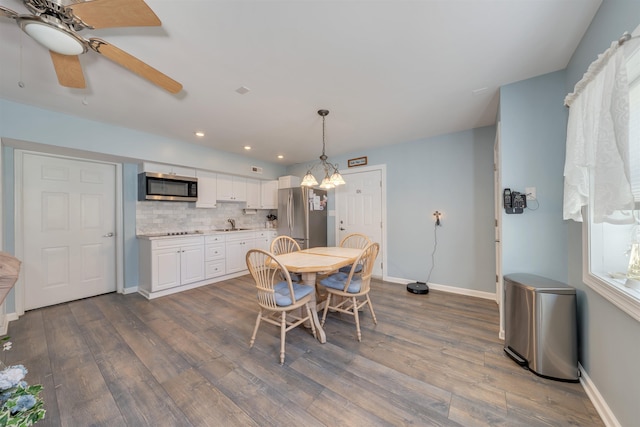 dining area with baseboards, a ceiling fan, dark wood-style floors, and recessed lighting
