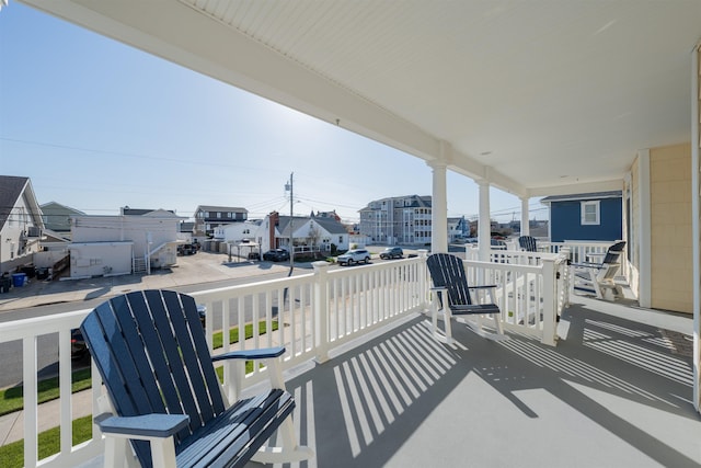 balcony featuring a residential view