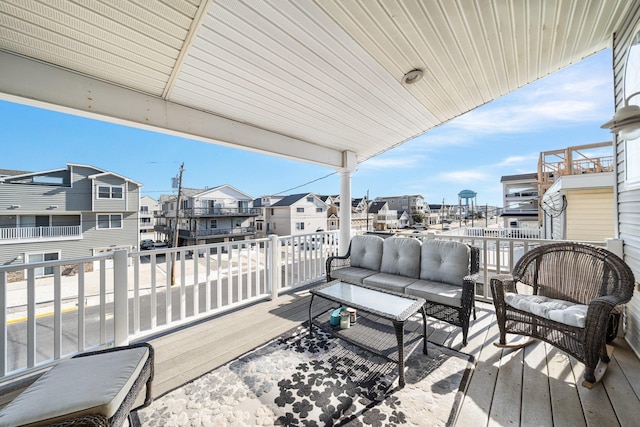 deck with a residential view and an outdoor hangout area