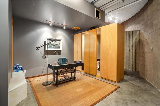 office space featuring concrete floors