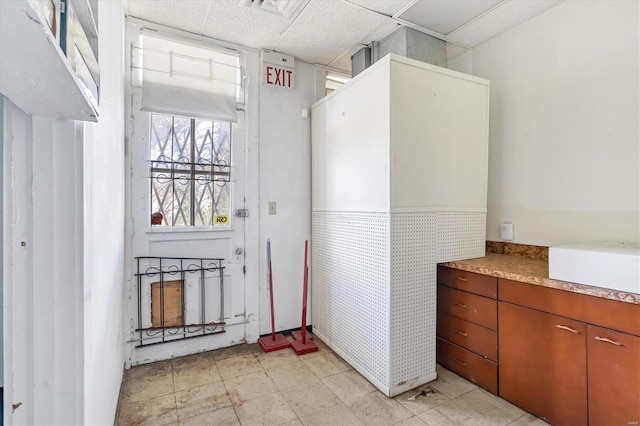 interior space featuring light tile floors