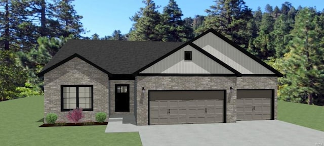 view of front of home featuring a front lawn and a garage