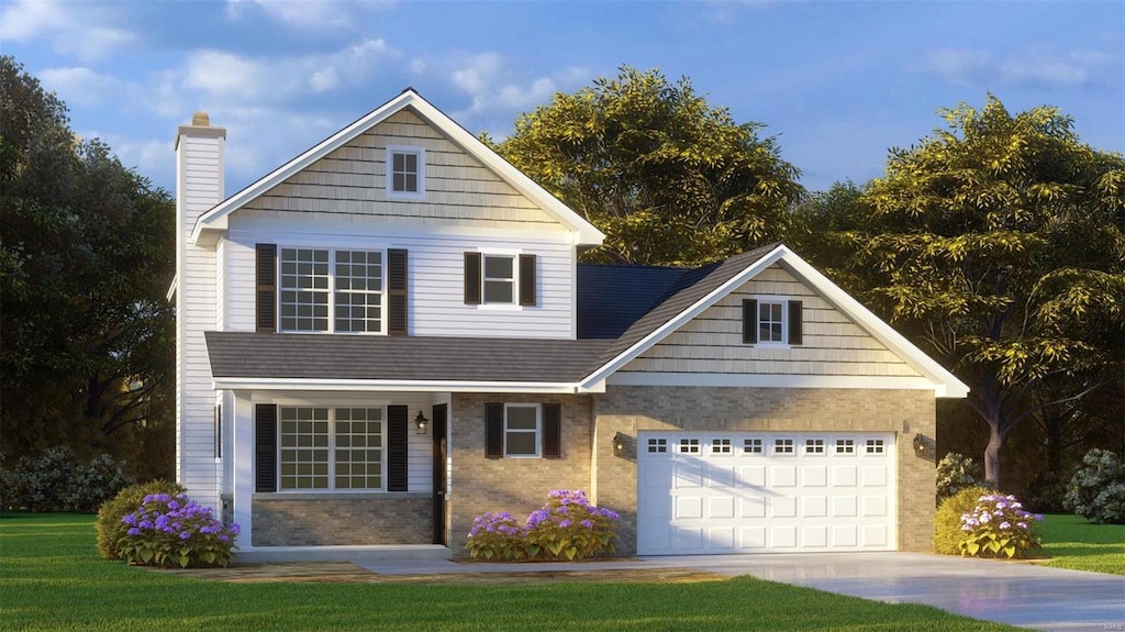 view of front of house featuring a front lawn and a garage