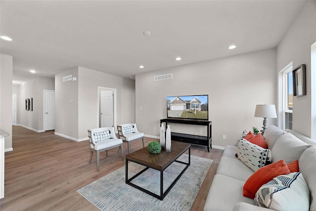 living room featuring light wood-type flooring