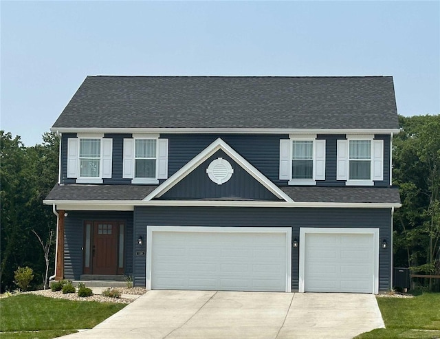 view of front of house with a garage