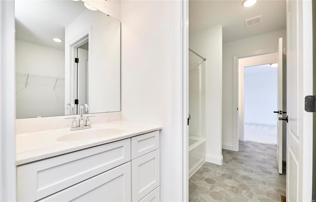 bathroom featuring shower / bathing tub combination, tile flooring, and vanity