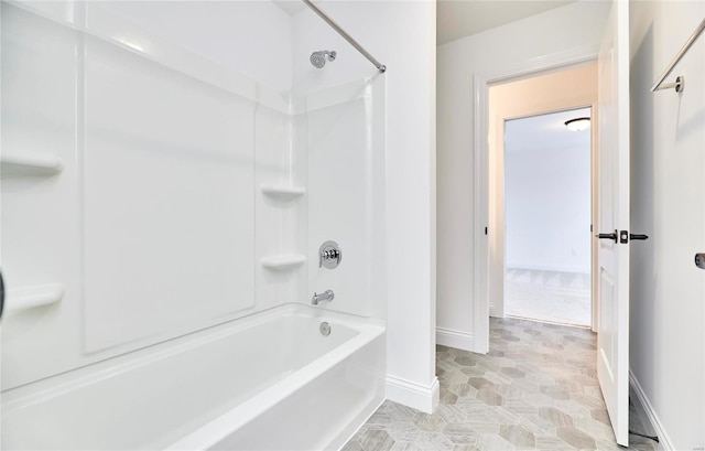 bathroom featuring tile floors and shower / bath combination