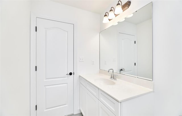 bathroom featuring oversized vanity