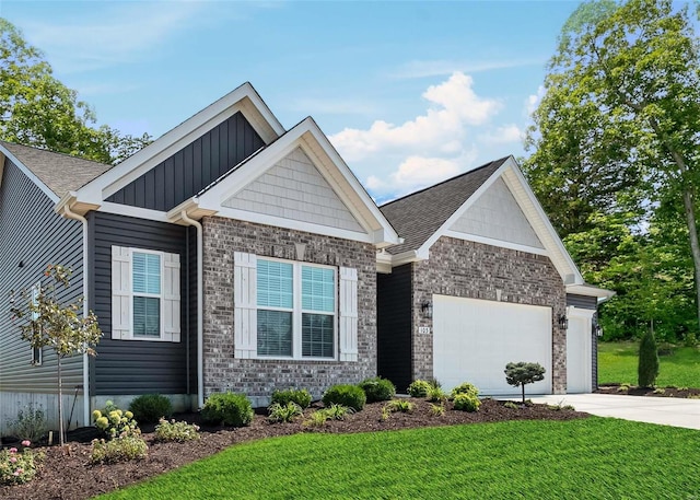 craftsman-style house featuring a front yard and a garage