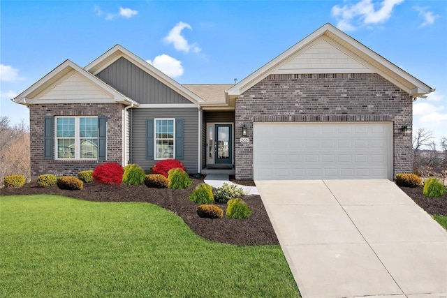 view of front facade with a front yard and a garage