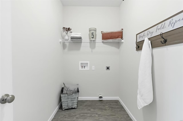 clothes washing area featuring dark hardwood / wood-style floors, washer hookup, and electric dryer hookup