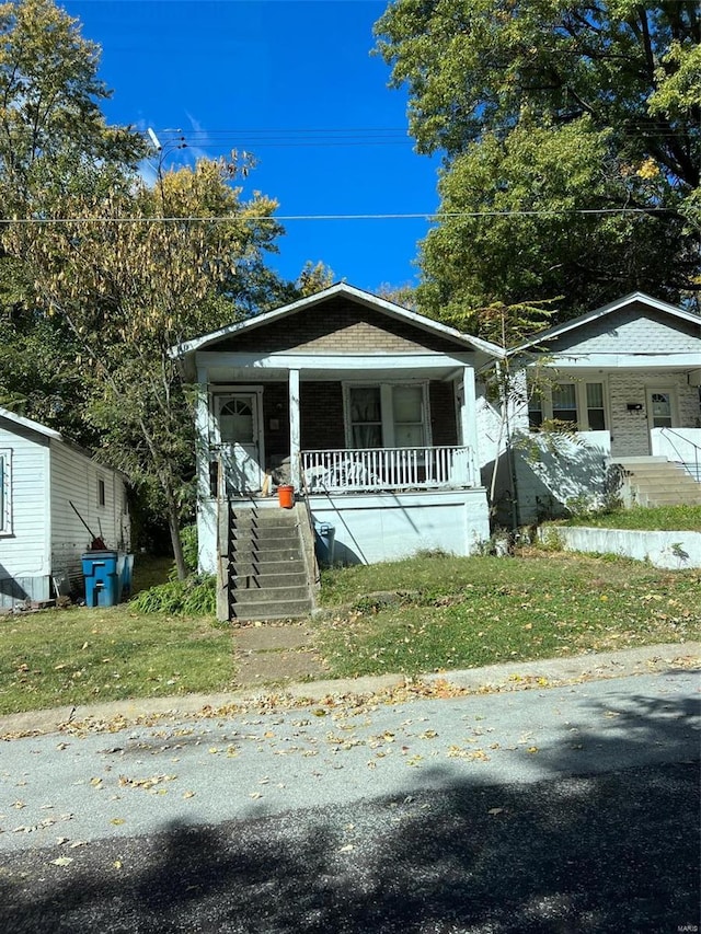 bungalow-style home featuring a porch