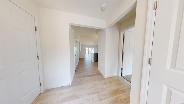 corridor featuring light wood-type flooring