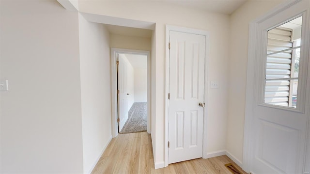 hallway featuring light hardwood / wood-style floors