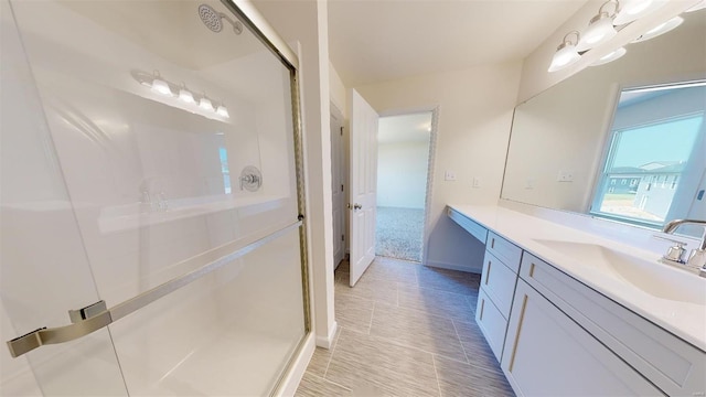 bathroom with vanity and tile patterned flooring