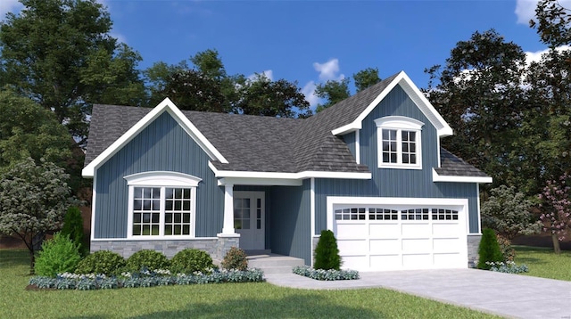 view of front of home featuring a front lawn and a garage