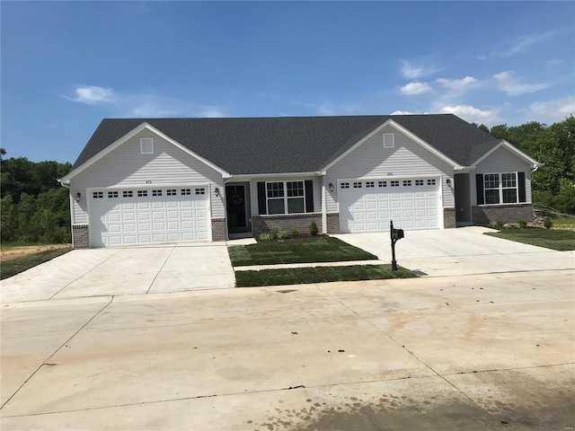 ranch-style house featuring a garage