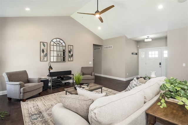 living room with ceiling fan, dark hardwood / wood-style floors, and high vaulted ceiling